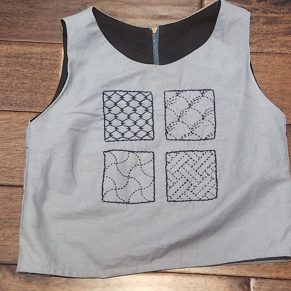 Gray Sleeveless Top with Navy Accents